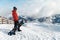 Snowboarder admiring the stunning view