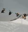 Snowboarder doing backflip freestyle snowboarding on the snow-covered slope of Les Arcs, France