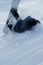 Snowboarder fall on winter snow. Conceptual image shot