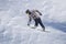 Snowboarder flying on the background of snowy slope. Extreme winter sports, snowboarding.