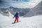 Snowboarder in high mountains