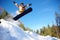 Snowboarder jumping