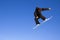 Snowboarder jumping high in the air