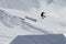 Snowboarder jumps in Snow Park, ski resort