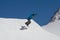 Snowboarder jumps in Snow Park, ski resort