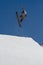 Snowboarder jumps in Snow Park, ski resort