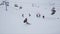 Snowboarder make extreme jump over trampoline at snowy mountain. Contest. Challenge. Ski resort