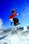 Snowboarder make a jump