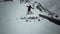 Snowboarder ride on iron rail make extreme jump at snowy mountain. Contest. Challenge. People