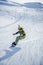 Snowboarder riding at French Alps mountain slopes