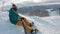 Snowboarder sit at top of mountain. Winter Scenic in the French Alps, Les 2 Alpes