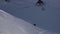 Snowboarder slide on slope and falling. Sunny day. Ski resort. People. Sport