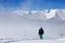 Snowboarder on snowy slope with new fallen snow