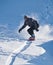 Snowboarder Speeding Downhill