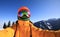 Snowboarder taking selfie on winter mountain top