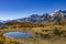 Snowboarder during a trick Autumn colors in the Italian alps of Alpe Devero a slope