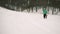 Snowboarder Walks Snow Slope