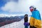 Snowboarder woman in mountains