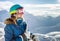 Snowboarder woman in the mountains Elbrus