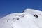 Snowboarders and skiers downhill on off piste slope at sun day