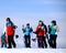 Snowboarders on the top of the winter mountain