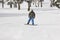 Snowboarding on a forest ski slope. White winter mountain landscape