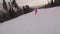 Snowboarding or skiing on a winter snowy slope. Ski resort, winter sport.