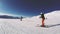 Snowboarding on a sunny day. Leisure activity. POV.