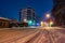 Snowbound city street at night