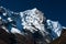 Snowbound mountain range and blue sky in Himalayas