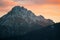 Snowcap mountain against colorful sunset sky background