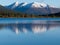 Snowcapped mountain reflection on Lapie Lake Yukon