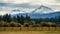 The Snowcapped Sisters Mountains in the The Cascades Mountain Range in Central Oregon During Fall Autumn