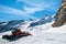 Snowcat machine to work on a snow field of Jungfraujoch, top of Europe Swiss alps scenery