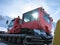 Snowcat on the mountain frosty winter day. Vehicle for preparing and clearing the slope on the winter resorts.