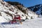 Snowcat and snow cannons on the mountain