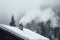 snowcovered chalet with smoke rising from chimney, pine trees backdrop