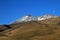 Snowcovered Volcano Tromen with full moon, Argentina