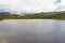 Snowdonia, River Dwyryd, sandbank, rocky hills and trees.