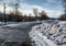 Snowdrifts and rural road