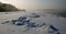 Snowdrifts in a winter lake