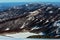 Snowed forest mountain lake aerial view, Lago Santo Appennino Emiliano