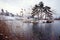 Snowed landscape on lake saint andre, savoy, france
