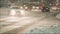 Snowfall on city roads, moving cars. Blurred background.