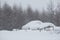 Snowfall and large snowdrifts in the village