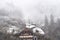 Snowfall over austrian mountain village