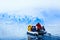 Snowfall over the boat with frozen tourists