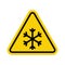 Snowfall sign. Snowfall warning sign. Yellow triangle sign with a snowflake icon inside. Caution, snowfall, slippery road. Road