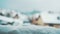 Snowfall and snowdrift on wooden handrail in foreground with falling snowflakes in the resort in mountains. Blurred background