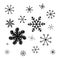 Snowflake black doodle icons. Design ice crystal drawing the hand scribble isolated on white background. Elements cartoon style.
